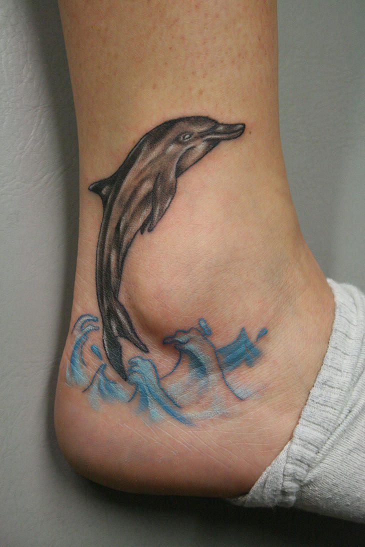 Cool Dolphin Tattoos On The Foot Picture 1