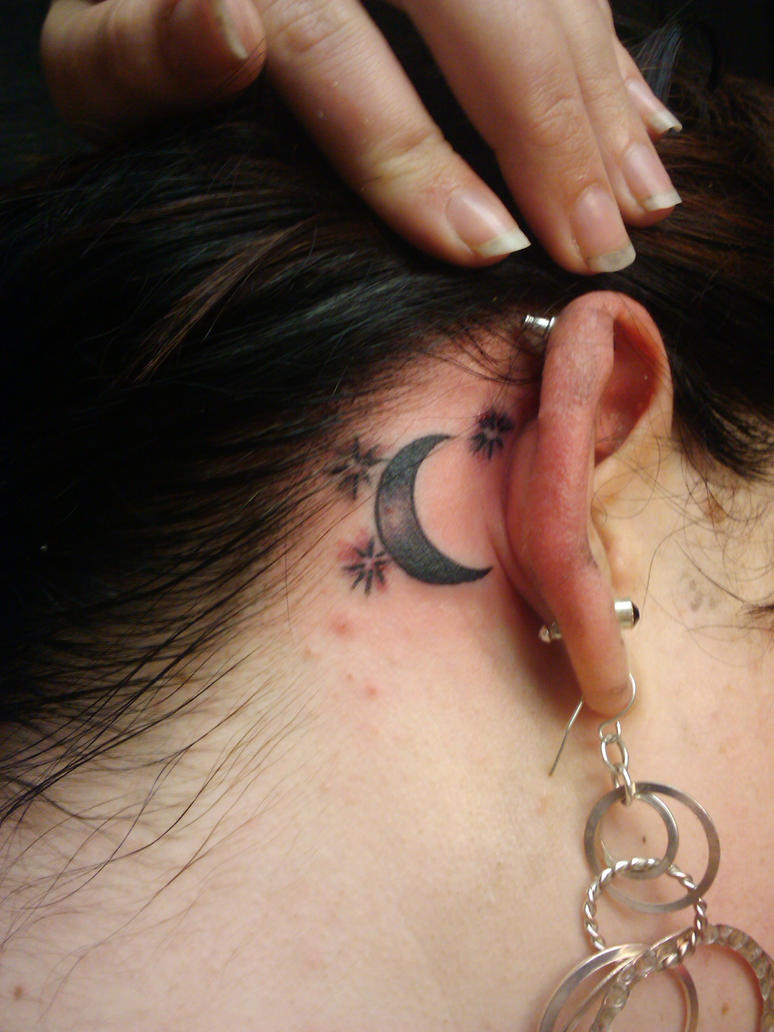 a moon and stars tattoo